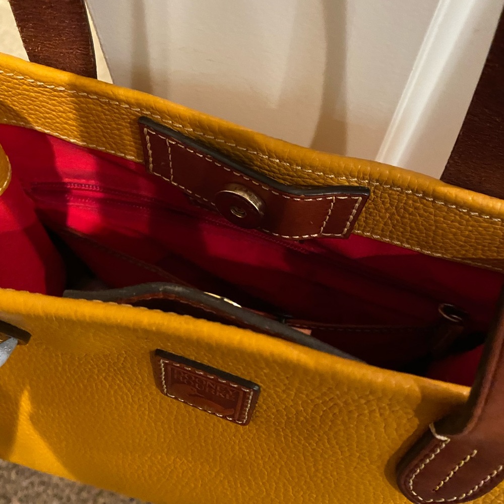 Dooney Bourke Mustard yellowish bad
